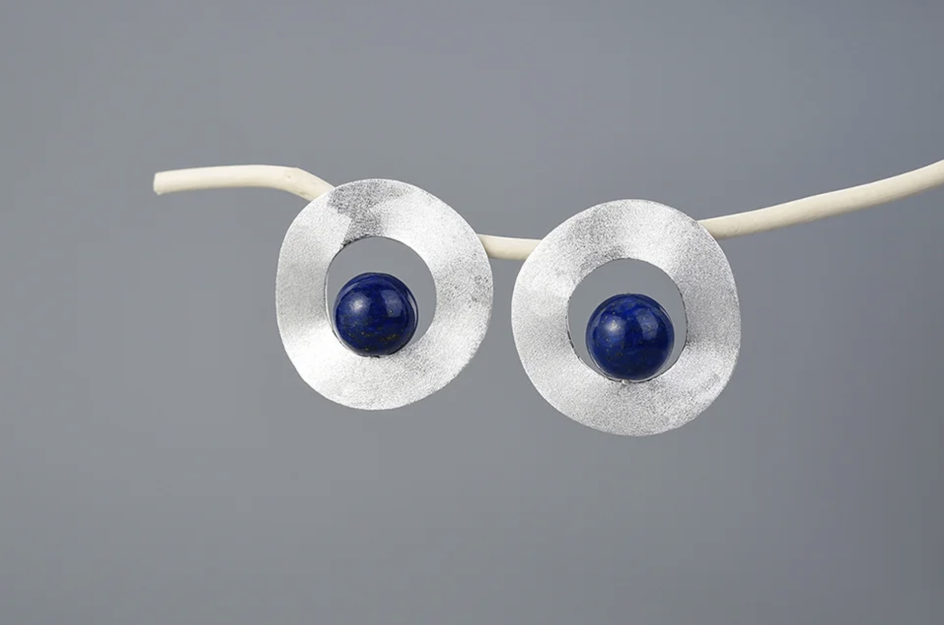 ARETES ÓRBITA AZUL